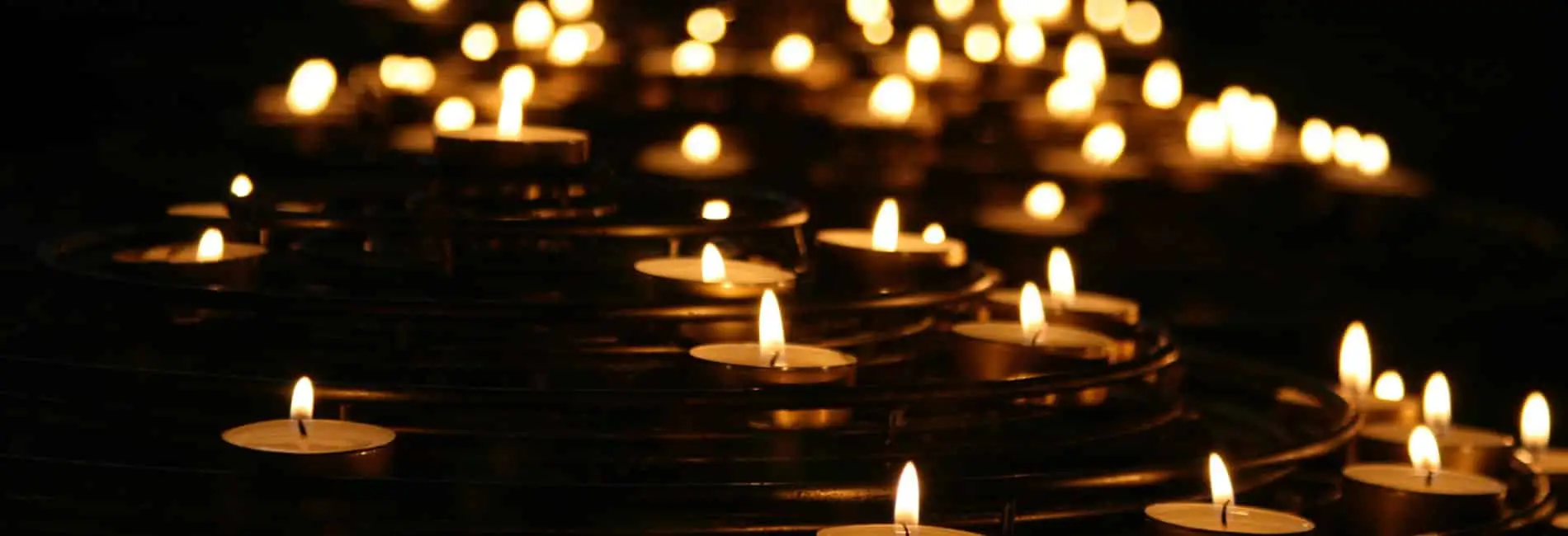 A number of candles illustrating Teen Grief and Loss Treatment | ThreePeaks Ascent, a short-term residential treatment center for teens and their families