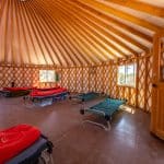 sleeping area inside a yurt at threepeaks resedential treatment