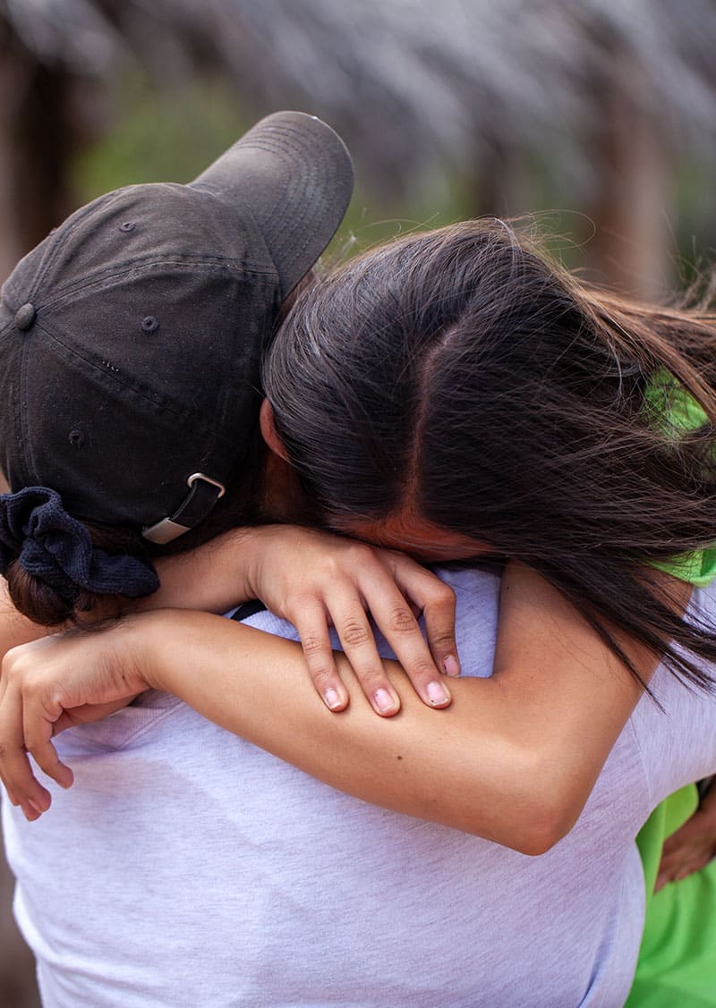 Parent-hug-at-graduationHealing-Power-of-Nature-Therapy-ThreePeaks-Ascent-Residential-Treatment-Center