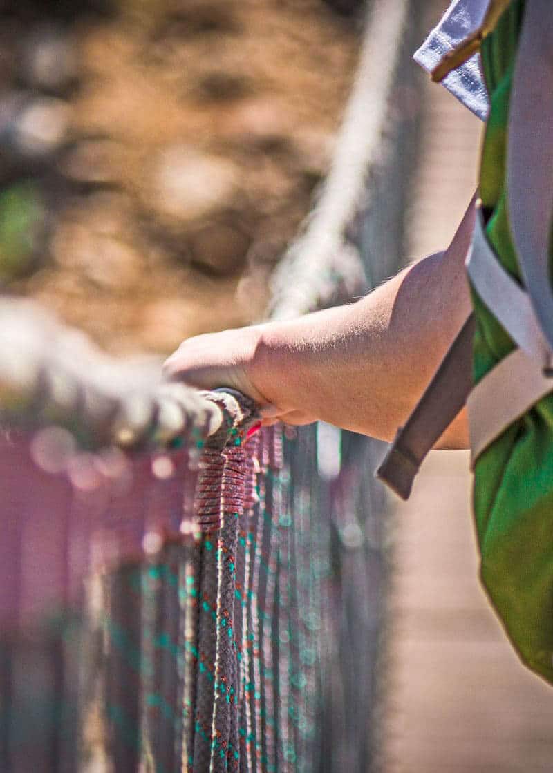 teens-out-in-nature-on-a-rope-bridge