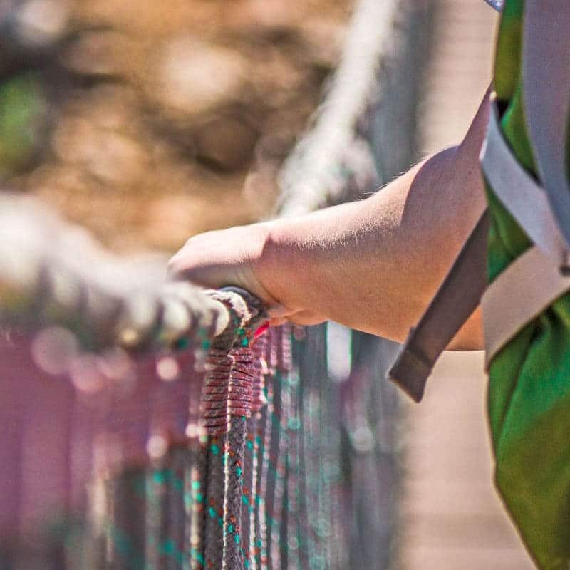 teens-out-in-nature-on-a-rope-bridge